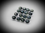 Bluish-green sapphire set 3.62 ct 4х3 mm