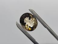 Brownish-yellow topaz 6.01 ct 12х10 mm