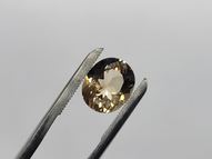 Brūni-dzeltens topāzs 6.01 ct 12х10 mm