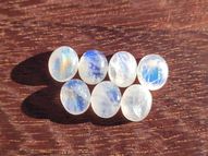 Rainbow moonstone set 7 pcs. 26.57 ct 11x9 mm