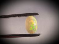 Rainbow opal 3.56 ct 13.9 x 9.5 mm