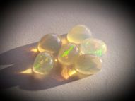 Rainbow opal set 4.10 ct 7x5 mm