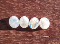 Rainbow moonstone set 4 pcs. 18.90 ct 11x9 mm