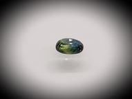 Unheated two-colour blue sapphire 0.63 ct 5.7 х 4.2 mm