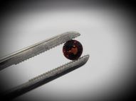 Reddish-orange spinel 0.53 ct 4.8 мм