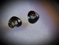 Unheated brownish-green sapphire pair 0.80 ct 4 mm