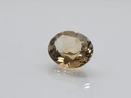 Brūni-dzeltens topāzs 6.01 ct 12х10 mm